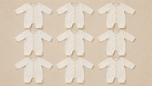 Personalised birth map print wrapped as a new baby gift, resting on a nursery dresser beside a card
